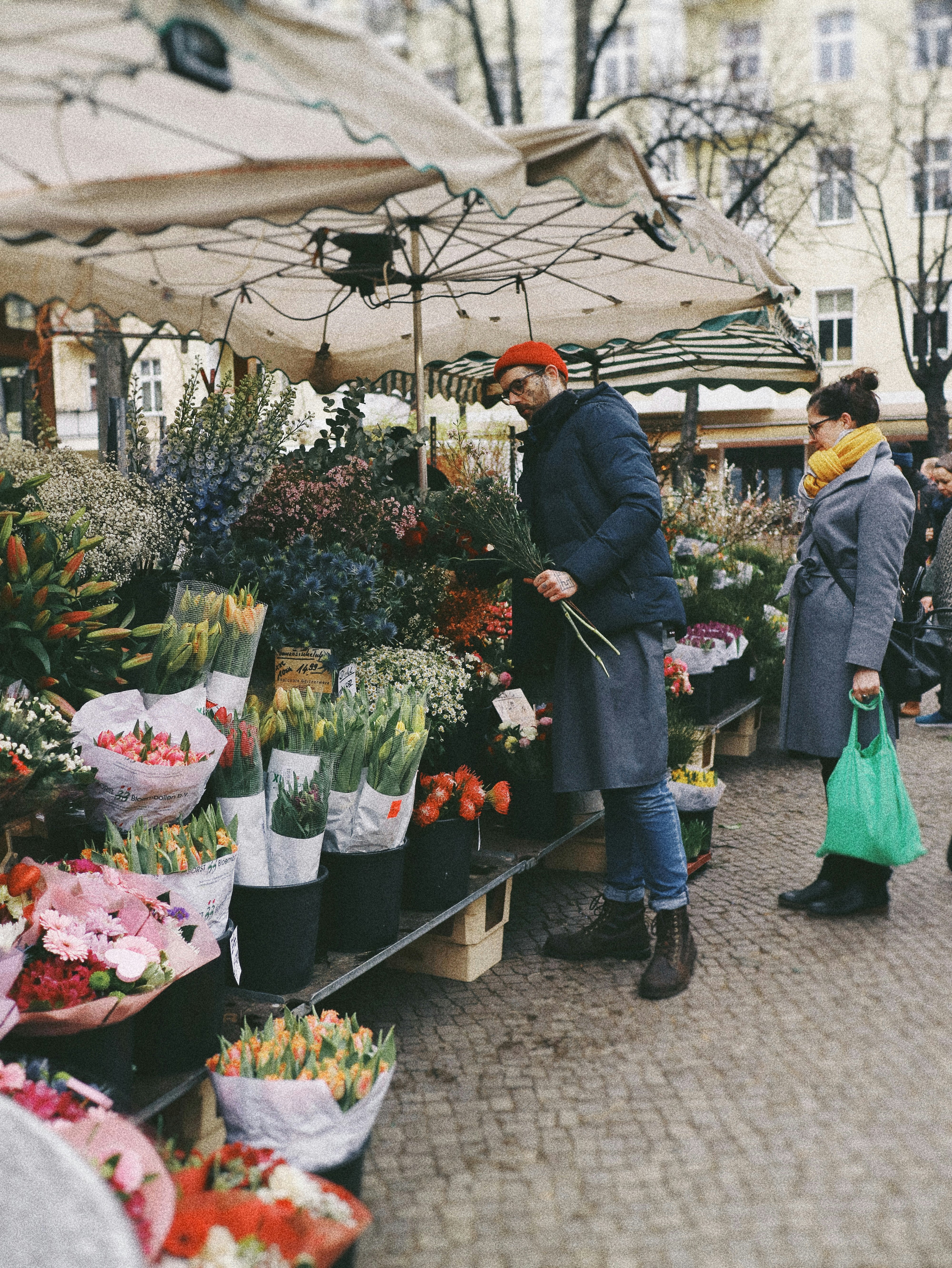 man holding flowers